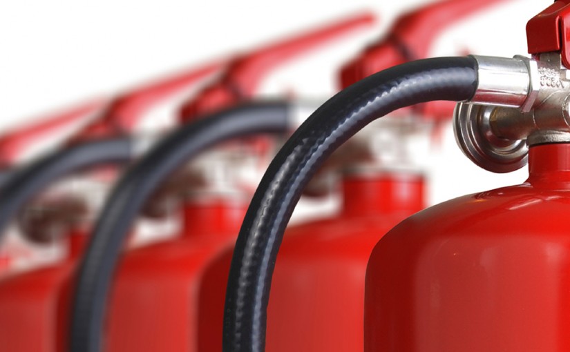 A row of fire extinguishers.