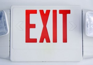White exit sign in commercial building.